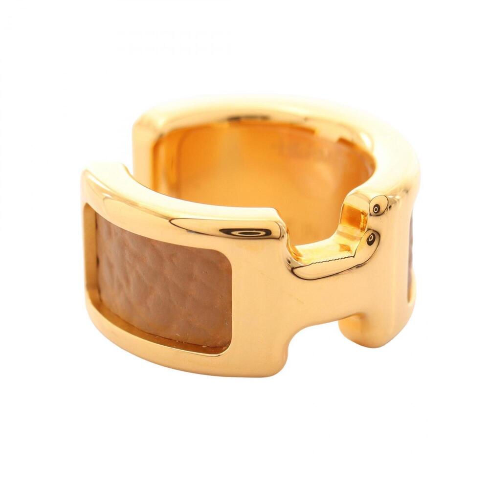 Hermes Olympe PM accessory, gold-plated leather, women's, gold and beige tones.